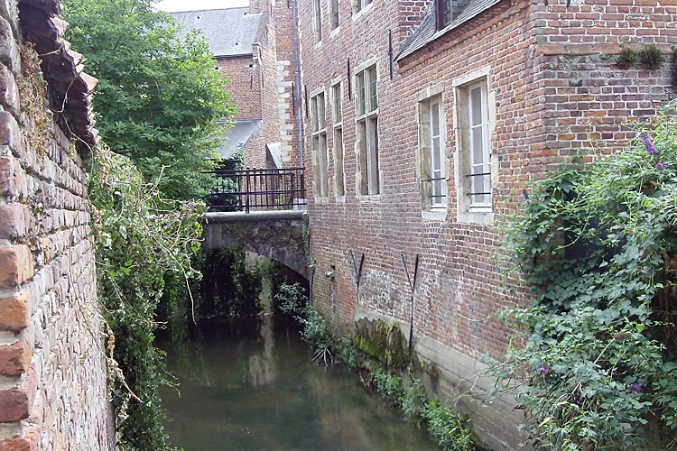 Branches of the Dijle River flow through the beguinage