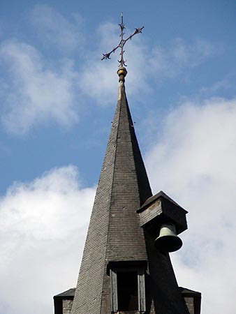 The bell outside the tower, at Saint James' Church of Leuven, one of the original seven wonders of the city