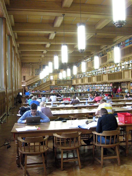 Students in the reading room of the Central Library, Leuven